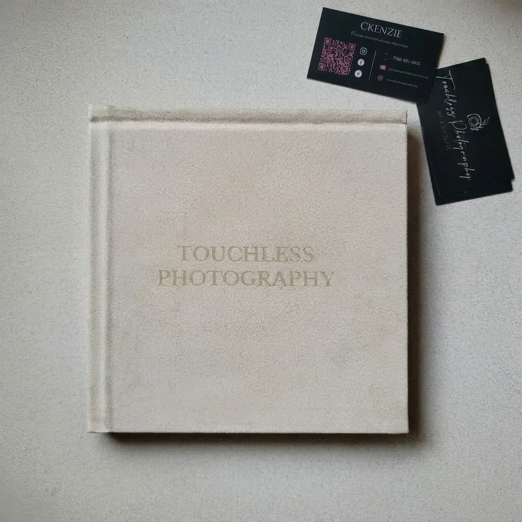 A Touchless Photography album with Ckenzie's business cards